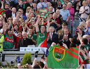 22 September 2013; Mayo minor captain Stephen Coen lifts the cup after victory over Tyrone. Electric Ireland GAA Football All-Ireland Minor Championship Final, Tyrone v Mayo, Croke Park, Dublin. Picture credit: Ray McManus / SPORTSFILE