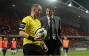 24 September 2013; Limerick FC manager Stuart Taylor in conversation with referee Graham Kelly at half-time. Airtricity League Premier Division, Limerick FC v Shamrock Rovers, Thomond Park, Limerick. Picture credit: Diarmuid Greene / SPORTSFILE