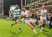 27 September 2013; Michael Allen, Ulster, supported by Luke Marshal, right, runs in for his side's second try of the game. Celtic League 2013/14, Round 4, Ulster v Benetton Treviso, Ravenhill, Belfast, Co. Antrim. Picture credit: Oliver McVeigh / SPORTSFILE