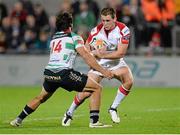 27 September 2013; Craig Gilroy, Ulster, is tackled by Ludovico Nitoglia, Benetton Treviso. Celtic League 2013/14, Round 4, Ulster v Benetton Treviso, Ravenhill, Belfast, Co. Antrim. Picture credit: Oliver McVeigh / SPORTSFILE