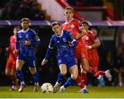 18 October 2024; Ben McCormack of Waterford in action against Evan Caffrey of Shelbourne during the SSE Airtricity Men's Premier Division match between Shelbourne and Waterford at Tolka Park in Dublin. Photo by Stephen McCarthy/Sportsfile