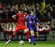 18 October 2024; Ali Coote of Shelbourne in action against Ben McCormack of Waterford during the SSE Airtricity Men's Premier Division match between Shelbourne and Waterford at Tolka Park in Dublin. Photo by Thomas Flinkow/Sportsfile