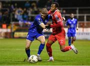 18 October 2024; Ryan Tulloch of Shelbourne in action against Darragh Power of Waterford during the SSE Airtricity Men's Premier Division match between Shelbourne and Waterford at Tolka Park in Dublin. Photo by Stephen McCarthy/Sportsfile