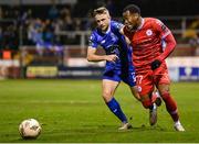 18 October 2024; Ryan Tulloch of Shelbourne in action against Darragh Power of Waterford during the SSE Airtricity Men's Premier Division match between Shelbourne and Waterford at Tolka Park in Dublin. Photo by Stephen McCarthy/Sportsfile