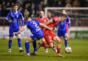 18 October 2024; John Martin of Shelbourne in action against Darragh Power of Waterford during the SSE Airtricity Men's Premier Division match between Shelbourne and Waterford at Tolka Park in Dublin. Photo by Stephen McCarthy/Sportsfile