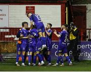 18 October 2024; Waterford players celebrate their side's first goal, scored by Padraig Amond of Waterford, during the SSE Airtricity Men's Premier Division match between Shelbourne and Waterford at Tolka Park in Dublin. Photo by Thomas Flinkow/Sportsfile