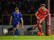 18 October 2024; Sean Boyd of Shelbourne shoots to score his side's first goal during the SSE Airtricity Men's Premier Division match between Shelbourne and Waterford at Tolka Park in Dublin. Photo by Stephen McCarthy/Sportsfile