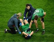 19 October 2024; Evan O'Carroll of Leinster is consoled by team-mate Kevin Feely, 10, as he receives medical attention for an injury during the Allianz GAA Football Interprovincial Championship Shield Final match between Leinster and Munster at Croke Park in Dublin. Photo by Piaras Ó Mídheach/Sportsfile