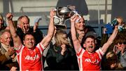 20 October 2024; Cuala joint-captains James Power, left, and Luke Keating lift the cup after the Dublin County Senior Club Football Championship final match between Cuala and Kilmacud Crokes at Parnell Park in Dublin. Photo by Daire Brennan/Sportsfile