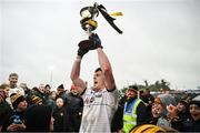 20 October 2024; Dara McVeety of Crosserlough lifts the trophy after the Cavan County Senior Club Football Championship final match between Crosserlough and Ramor United at Kingspan Breffni in Cavan. Photo by Ramsey Cardy/Sportsfile