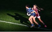 22 October 2024; Clara Oliveira Luz of St. Helen's SNS and Oliva Bergin of Scoil Maelruáin SNS during the match between Scoil Maelruáin SNS, Old Bawn, Dublin, and St. Helen's SNS, Portmarnock, Dublin, on day two of the Allianz Cumann na mBunscol Finals at Croke Park in Dublin. Photo by Ramsey Cardy/Sportsfile