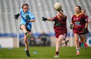 22 October 2024; Leah Flynn of St. Laurence's NS, Baldoyle, Dublin, and Molly Fitzsimons of Sacred Heart NS, Sruleen, Dublin, during day two of the Allianz Cumann na mBunscol Finals at Croke Park in Dublin. Photo by Ramsey Cardy/Sportsfile