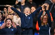 22 October 2024; Holy Cross NS supporters celebrate during the match between Holy Cross NS, Dundrum, Dublin and Sacred Heart NS, Sruleen, Dublin, on day two of the Allianz Cumann na mBunscol Finals at Croke Park in Dublin. Photo by Ramsey Cardy/Sportsfile