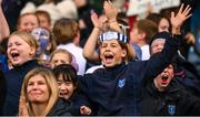 22 October 2024; Holy Cross NS supporters celebrate during the match between Holy Cross NS, Dundrum, Dublin and Sacred Heart NS, Sruleen, Dublin, on day two of the Allianz Cumann na mBunscol Finals at Croke Park in Dublin. Photo by Ramsey Cardy/Sportsfile