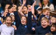 22 October 2024; Holy Cross NS supporters celebrate during the match between Holy Cross NS, Dundrum, Dublin and Sacred Heart NS, Sruleen, Dublin, on day two of the Allianz Cumann na mBunscol Finals at Croke Park in Dublin. Photo by Ramsey Cardy/Sportsfile