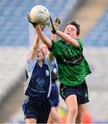 22 October 2024; Lucy Ní Chadhla of Gaelscoil Bhaile Brigín and Caoimhe Seinicín of Gaelscoil Shliabh Rua during the match between Gaelscoil Shliabh Rua, Dublin and Gaelscoil Bhaile Brigín, Dublin, on day two of the Allianz Cumann na mBunscol Finals at Croke Park in Dublin. Photo by Ramsey Cardy/Sportsfile