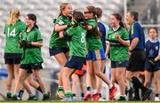 22 October 2024; Gaelscoil Bhaile Brigín players, from left, Holly Nic Amhlaí, Jessica Nic Sandair and Bobbie Nic Eamharcaigh react at the final whistle of the match between Gaelscoil Shliabh Rua, Dublin and Gaelscoil Bhaile Brigín, Dublin, on day two of the Allianz Cumann na mBunscol Finals at Croke Park in Dublin. Photo by Ramsey Cardy/Sportsfile