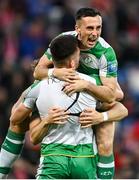 24 October 2024; Josh Honohan of Shamrock Rovers, bottom, celebrates with team mates including Aaron McEneff, top, after scoring their side's first goal during the UEFA Conference League 2024/25 league phase match between Larne and Shamrock Rovers at the National Football Stadium at Windsor Park in Belfast, Northern Ireland. Photo by David Fitzgerald/Sportsfile