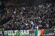 24 October 2024; Shamrock Rovers supporters celebrate their second goal, scored by Johnny Kenny, not pictured, during the UEFA Conference League 2024/25 league phase match between Larne and Shamrock Rovers at the National Football Stadium at Windsor Park in Belfast, Northern Ireland. Photo by Ben McShane/Sportsfile