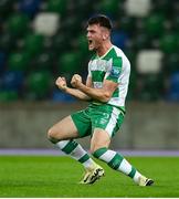 24 October 2024; Josh Honohan of Shamrock Rovers celebrates his side's third goal, scored by team mate Graham Burke, not pictured, during the UEFA Conference League 2024/25 league phase match between Larne and Shamrock Rovers at the National Football Stadium at Windsor Park in Belfast, Northern Ireland. Photo by David Fitzgerald/Sportsfile