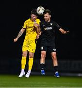 24 October 2024; Kian Corbally of Wexford and Daniel McKenna of Athlone Town battle for possession during the SSE Airtricity Men's First Division Play-Off semi-final first leg match between Athlone Town and Wexford at Athlone Town Stadium in Westmeath. Photo by Tyler Miller/Sportsfile