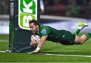 26 October 2024; Caolin Blade of Connacht dives over to score his side's second try during the United Rugby Championship match between Connacht and Dragons at Dexcom Stadium in Galway. Photo by Tyler Miller/Sportsfile