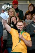 26 October 2024; Ireland goalkeeper and captain Enda Rowland lifts the Mowi Quaich Cup after the Shinty International match between Ireland and Scotland at Cusack Park in Ennis, Clare. Photo by Ray McManus/Sportsfile