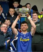 27 October 2024; Scotstown captain Damien McArdle lifts the Mick Duffy cup after the Monaghan County Senior Club Football Championship final match between Clontibret O'Neills and Scotstown at St Tiernach's Park in Clones, Monaghan. Photo by Philip Fitzpatrick/Sportsfile