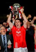 27 October 2024; Darragh O'Donovan of Doon lifts the John Daly Cup after the Limerick County Senior Club Hurling Championship final match between Na Piarsaigh and Doon at TUS Gaelic Grounds in Limerick. Photo by Ray McManus/Sportsfile