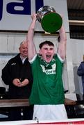 27 October 2024; Newbridge captain Conor McAteer lifts the cup after his side's victory in  the Derry County Senior Club Football Championship final match between Glen and Newbridge at Celtic Park in Derry. Photo by Oliver McVeigh/Sportsfile