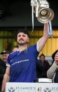 27 October 2024; Thomastown captain Jay Burke lifts the cup after the Kilkenny County Senior Club Hurling Championship final match between O’Loughlin Gaels and Thomastown at UPMC Nowlan Park in Kilkenny. Photo by Michael P Ryan/Sportsfile