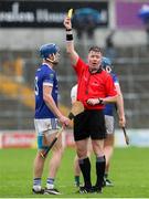 27 October 2024; Stephen Donnelly of Thomastown is shown a yellow card by referee David Hughes during the Kilkenny County Senior Club Hurling Championship final match between O’Loughlin Gaels and Thomastown at UPMC Nowlan Park in Kilkenny. Photo by Michael P Ryan/Sportsfile