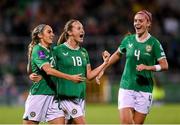 29 October 2024; Kyra Carusa of Republic of Ireland, 18 celebrates with team-mate Julie-Ann Russell, left, and Caitlin Hayes, right, after scoring their side's second goal during the UEFA Women's EURO 2025 Play-Off Round 1 second leg match between Republic of Ireland and Georgia at Tallaght Stadium in Dublin. Photo by Stephen McCarthy/Sportsfile