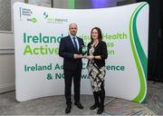 5 November 2024; Karl Dunne, CEO of Ireland Action, presents Tina Dowling from The Watershed, Kilkenny, who received an award for Sustainable Project/Initiative Of The Year in the Leisure, Health and Fitness Industry, during the 2024 National Quality Standard Awards ceremony at the Killashee Hotel in Naas, Kildare. Photo by Matt Browne/Sportsfile