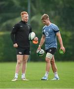 3 November 2024; Ciarán Frawley, left, and Jack Crowley during an Ireland Rugby squad training session at The Campus in Quinta da Lago, Portugal. Photo by Seb Daly/Sportsfile