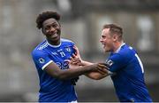 3 November 2024; St Loman’s players Fola Ayorinde, left, and Rory Sheahan after their side's victory in the AIB Leinster GAA Senior Club Football Championship Round 1 match between Dunshaughlin and St Loman's at Páirc Tailteann in Navan, Meath. Photo by Seb Daly/Sportsfile