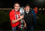 1 November 2024; Evan Caffrey of Shelbourne and his father Peter celebrate with the SSE Airtricity Men's Premier Division trophy after the SSE Airtricity Men's Premier Division match between Derry City and Shelbourne at The Ryan McBride Brandywell Stadium in Derry. Photo by Stephen McCarthy/Sportsfile