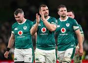 8 November 2024; Tadhg Beirne of Ireland, centre, with team-mates Peter O’Mahony, left, and Iain Henderson after their side's defeat in the Autumn Nations Series match between Ireland and New Zealand at the Aviva Stadium in Dublin. Photo by Seb Daly/Sportsfile