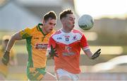 10 November 2024; Eoin Colleran of Pádraig Pearses in action against Liam Burke of Corofin during the AIB Connacht GAA Senior Club Football Championship quarter-final match between Corofin and Pádraig Pearses at Tuam Stadium in Tuam, Galway. Photo by Piaras Ó Mídheach/Sportsfile