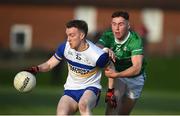 10 November 2024; Mark Kavanagh of Errigal Ciarán in action against Conan Johnson of Cargin during the AIB Ulster GAA Senior Club Football Championship quarter-final match between Cargin and Errigal Ciarán at Corrigan Park in Belfast. Photo by Philip Fitzpatrick/Sportsfile