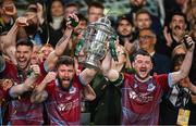 10 November 2024; Drogheda United captain Gary Deegan, left, and teammate Ryan Brennan lift the FAI Cup after the Sports Direct Men's FAI Cup Final match between Drogheda United and Derry City at the Aviva Stadium in Dublin.  Photo by Seb Daly/Sportsfile