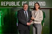 14 November 2024; Kate Thompson is presented with the Women's Under-19 International Player of the Year award by FAI President Paul Cooke during the 34th FAI International Awards at the Aviva Stadium. Photo by Ben McShane/Sportsfile