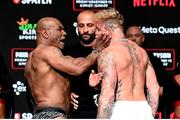 14 November 2024; Mike Tyson, left, and Jake Paul face off during weigh-ins, held at Toyota Music Factory in Irving, Texas, USA, ahead of their heavyweight bout, on November 15th at AT&T Stadium in Arlington, Texas. Photo by Stephen McCarthy/Sportsfile