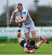 16 November 2024; Andrew Osborne of Leinster A is tackled by Tomás Farthing of Connacht Eagles during the 'A' Interprovincial rugby match between Connacht Eagles and Leinster A at Creggs RFC in Creggs, Galway. Photo by Tom Beary/Sportsfile