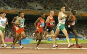 25 August 2004; Ireland's Mark Carroll (6) and Kenya's Eliud Kipchoge (9) lead the field during his heat of the Men's 5000m. Olympic Stadium. Games of the XXVIII Olympiad, Athens Summer Olympics Games 2004, Athens, Greece. Picture credit; Brendan Moran / SPORTSFILE