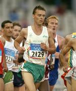 25 August 2004; Ireland's Alastair Cragg (2129) in action during his heat of the Men's 5000m in which he qualified for the final. Olympic Stadium. Games of the XXVIII Olympiad, Athens Summer Olympics Games 2004, Athens, Greece. Picture credit; Brendan Moran / SPORTSFILE