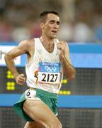 25 August 2004; Ireland's Mark Carroll in action during his heat of the Men's 5000m in which he failed to qualify for the final. Olympic Stadium. Games of the XXVIII Olympiad, Athens Summer Olympics Games 2004, Athens, Greece. Picture credit; Brendan Moran / SPORTSFILE