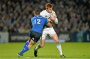27 September 2013; Rhys Patchell, Cardiff Blues, is tackled by Noel Reid, Leinster. Celtic League 2013/14, Round 4, Leinster v Cardiff Blues, RDS, Ballsbridge, Dublin. Picture credit: Brendan Moran / SPORTSFILE