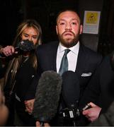 22 November 2024; Mr Conor McGregor leaves court, after the court announced the jury’s decision in the civil action case, P Ní Laimhin v McGregor & Anor, in High Court 24 at Chancery Place in Dublin. Photo by David Fitzgerald/Sportsfile