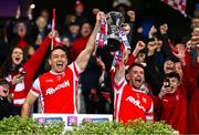 30 November 2024; Cuala captain James Power, left, and teammate Luke Keating lift the McCabe Cup after his side's victory in the AIB Leinster GAA Senior Club Football Championship final match between Cuala of Dublin and Ardee St Mary's of Louth at Croke Park in Dublin. Photo by Ben McShane/Sportsfile